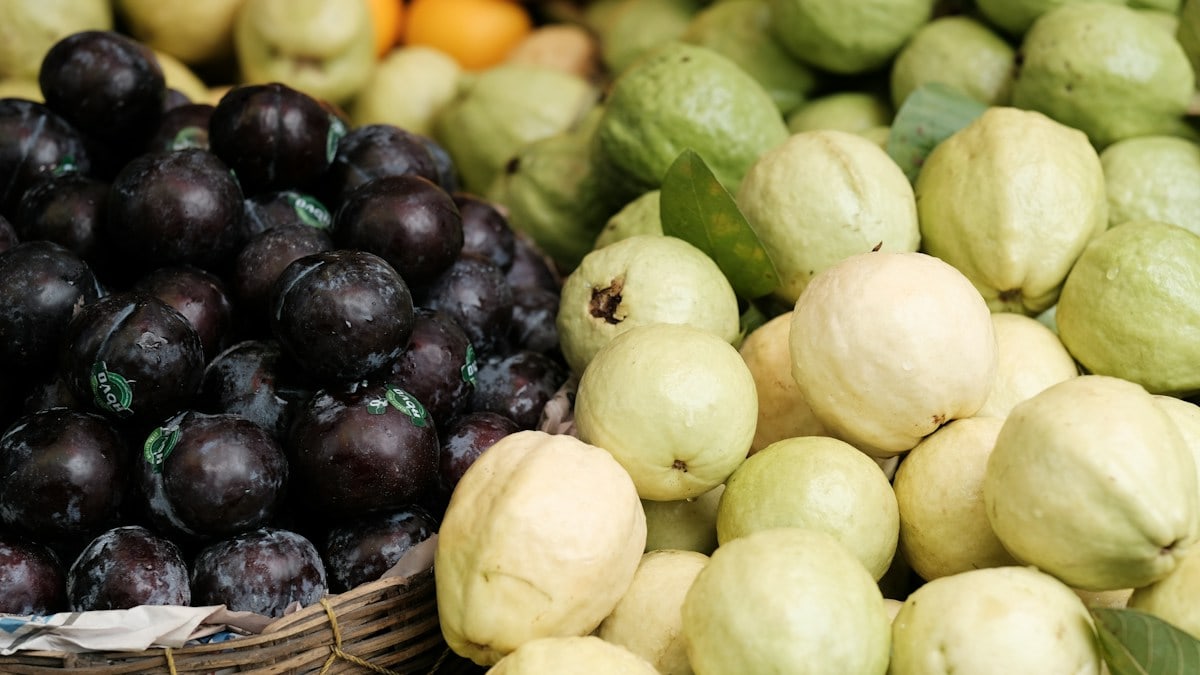 A pile of fruit sitting next to each other
